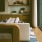 close up of a couch next to a window