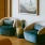 two blue and white chairs with a table between them